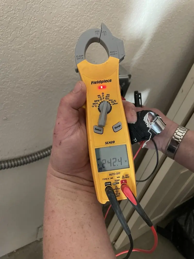 Voltage testing with clamp meter during Generator Installation in Winnsboro